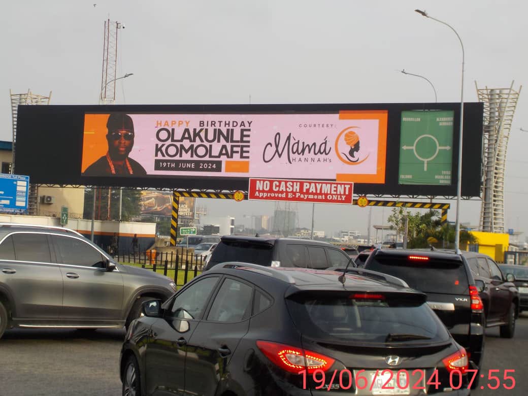 A Buzz campaign displayed on a roadside LED billboard in Lagos